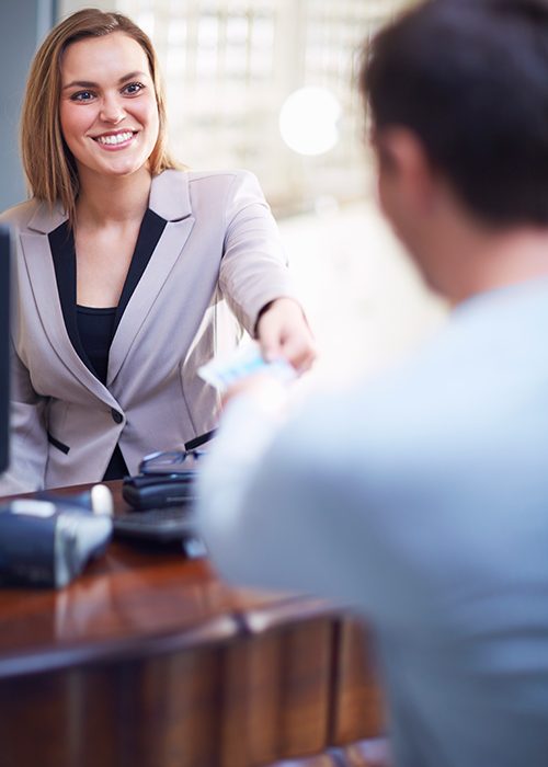 Branch employee smiling at customer-NJ ITM service